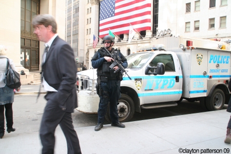 Sweating on Wall Street- who is cop watching or protecting- me or the suit?